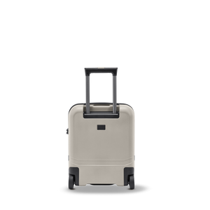 Rückseite des robusten Underseater-Koffers in Creme aus einer stoßfesten Polycarbonat/ABS-Mischung