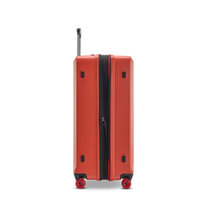 Seitenansicht des BUZZ Trolleys L in Rosso Clay mit Volumenerweiterung und smartem NFC Tag mit Stratic Connect