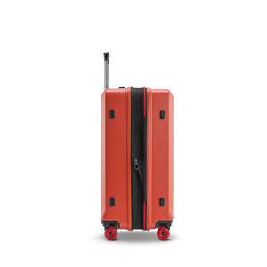 Seitenansicht des BUZZ Trolleys M in Rosso Clay mit Volumenerweiterung und smartem NFC Tag mit Stratic Connect