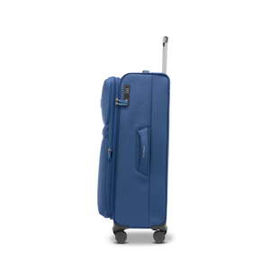 Seitliche Ansicht des LITE Koffers L in blue mit gepolstertem Tragegriff für lange Urlaubsreisen