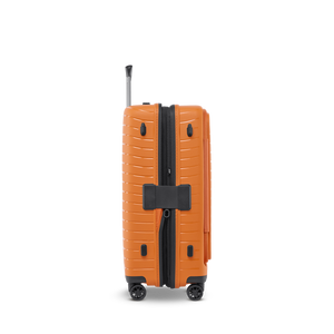 Profilansicht des geschlossenen Stratic Novium ML Trolleys in Rosso Clay mit 68-77 Litern erweiterbarem Volumen