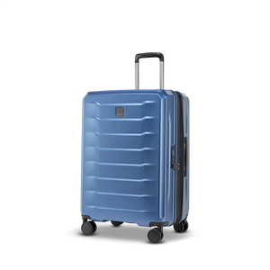 Vorderansicht des PHOENIX SL Hartschalenkoffers (Größe M) mit modernem Rillendesign in Dark Blue