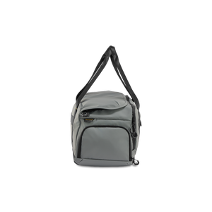 STRATIC Vibe Duffle Bag L gris, vue latérale avec compartiment zippé pratique