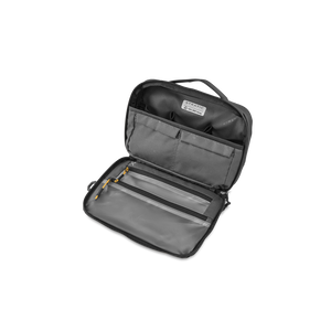 STRATIC Vibe Toiletry Bag zwart geopend – ritsvakken en insteekvakken binnenin